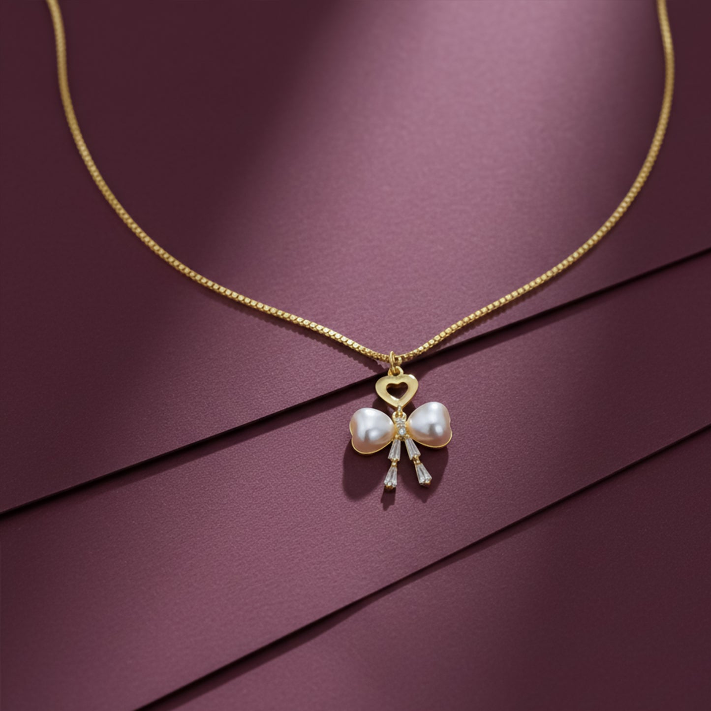 Elegant Gold Heart & Pearl Bow Necklace