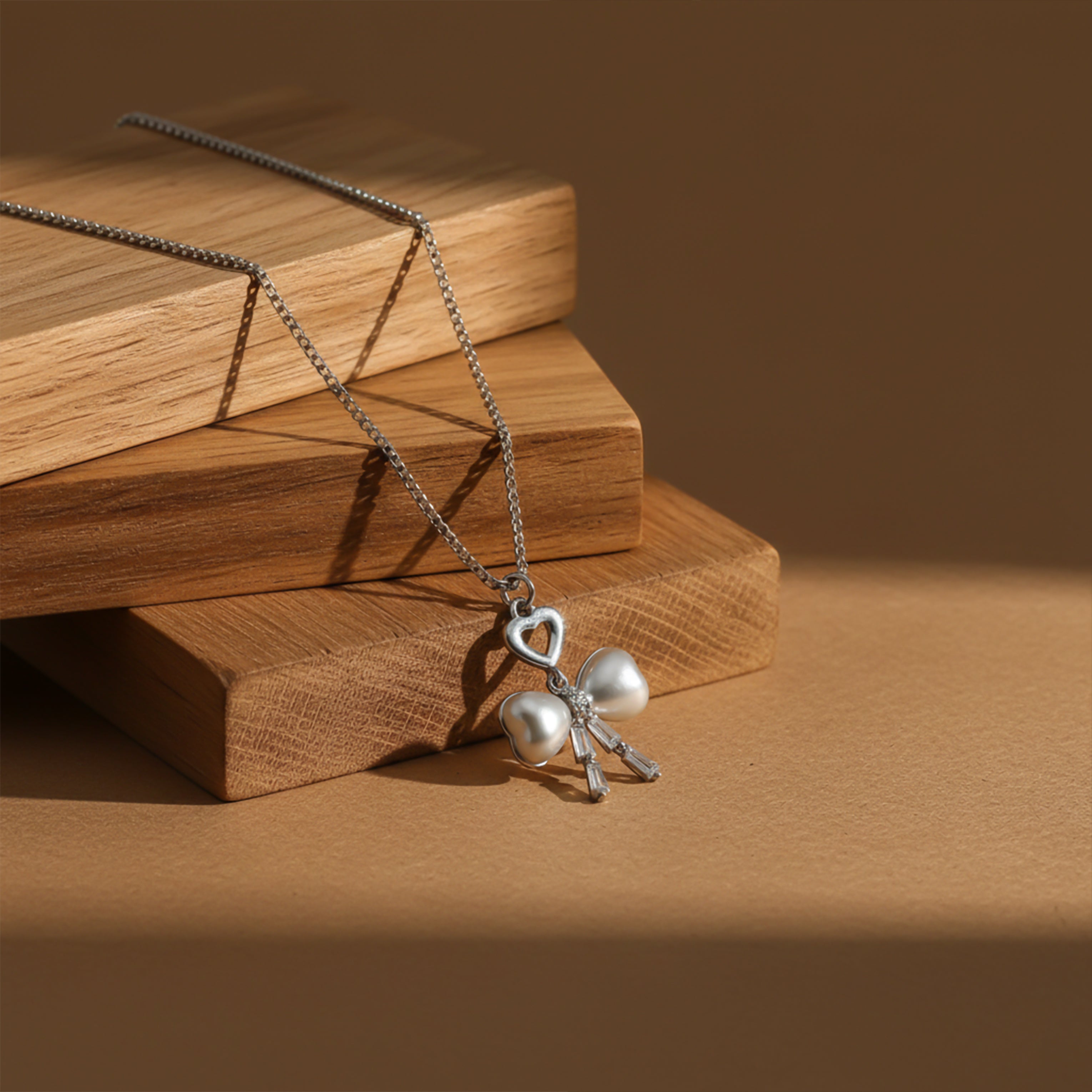 Elegant Silver Heart & Pearl Bow Necklace