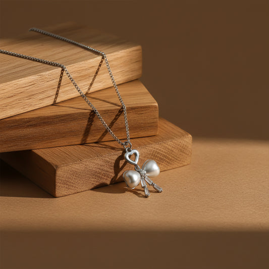 Elegant Silver Heart & Pearl Bow Necklace