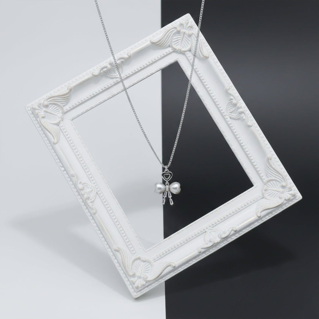 Elegant Silver Heart & Pearl Bow Necklace