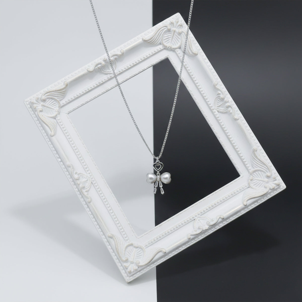Elegant Silver Heart & Pearl Bow Necklace