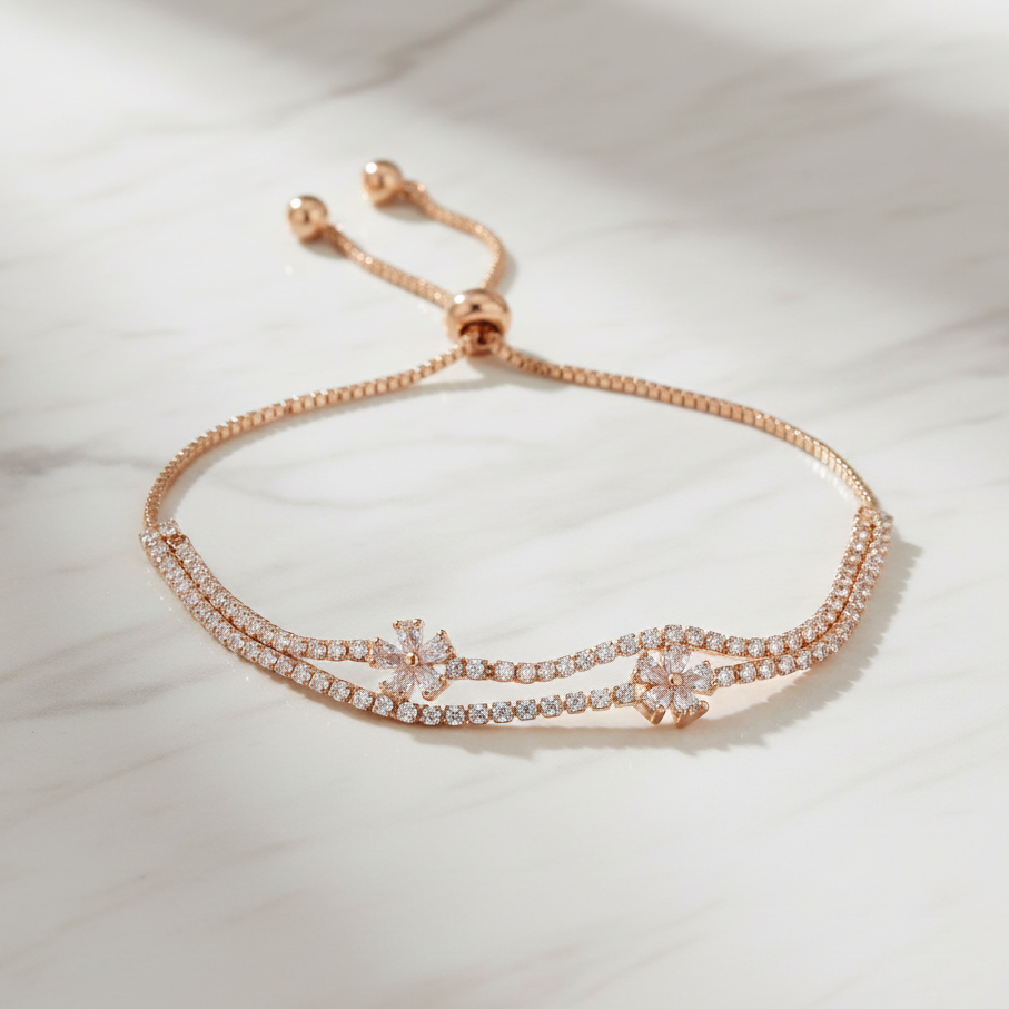 Rose gold bracelet with diamond accents on a light background