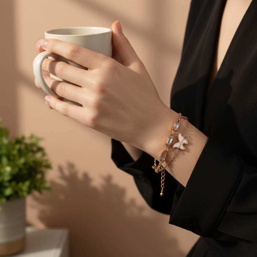 Person holding a white mug with a plant in the background